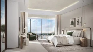 Master bedroom in a sky villa at Atelis at d3 featuring floor-to-ceiling windows, elegant interior design, premium finishes, and panoramic city views over Dubai Design District. Presented by Tohid Fetrat.
