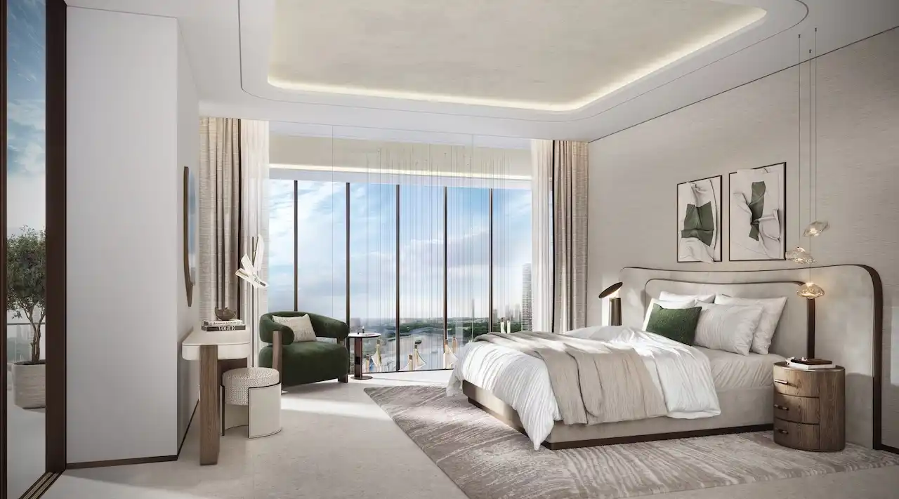 Master bedroom in a sky villa at Atelis at d3 featuring floor-to-ceiling windows, elegant interior design, premium finishes, and panoramic city views over Dubai Design District. Presented by Tohid Fetrat.