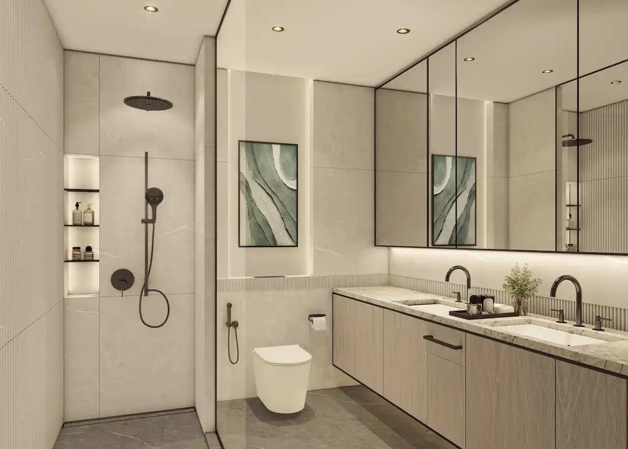 Modern bathroom in a typical residence at Atelis at d3 featuring premium stone finishes, walk-in shower, custom vanity, and contemporary fixtures within Dubai Design District. Presented by Tohid Fetrat.