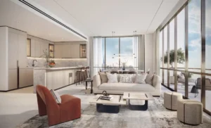 Open-plan living area in a typical residence at Atelis at d3, featuring contemporary seating, integrated kitchen and dining spaces, floor-to-ceiling windows, and Dubai skyline views in Dubai Design District. Presented by Tohid Fetrat.