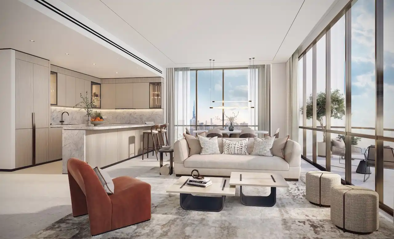 Open-plan living area in a typical residence at Atelis at d3, featuring contemporary seating, integrated kitchen and dining spaces, floor-to-ceiling windows, and Dubai skyline views in Dubai Design District. Presented by Tohid Fetrat.