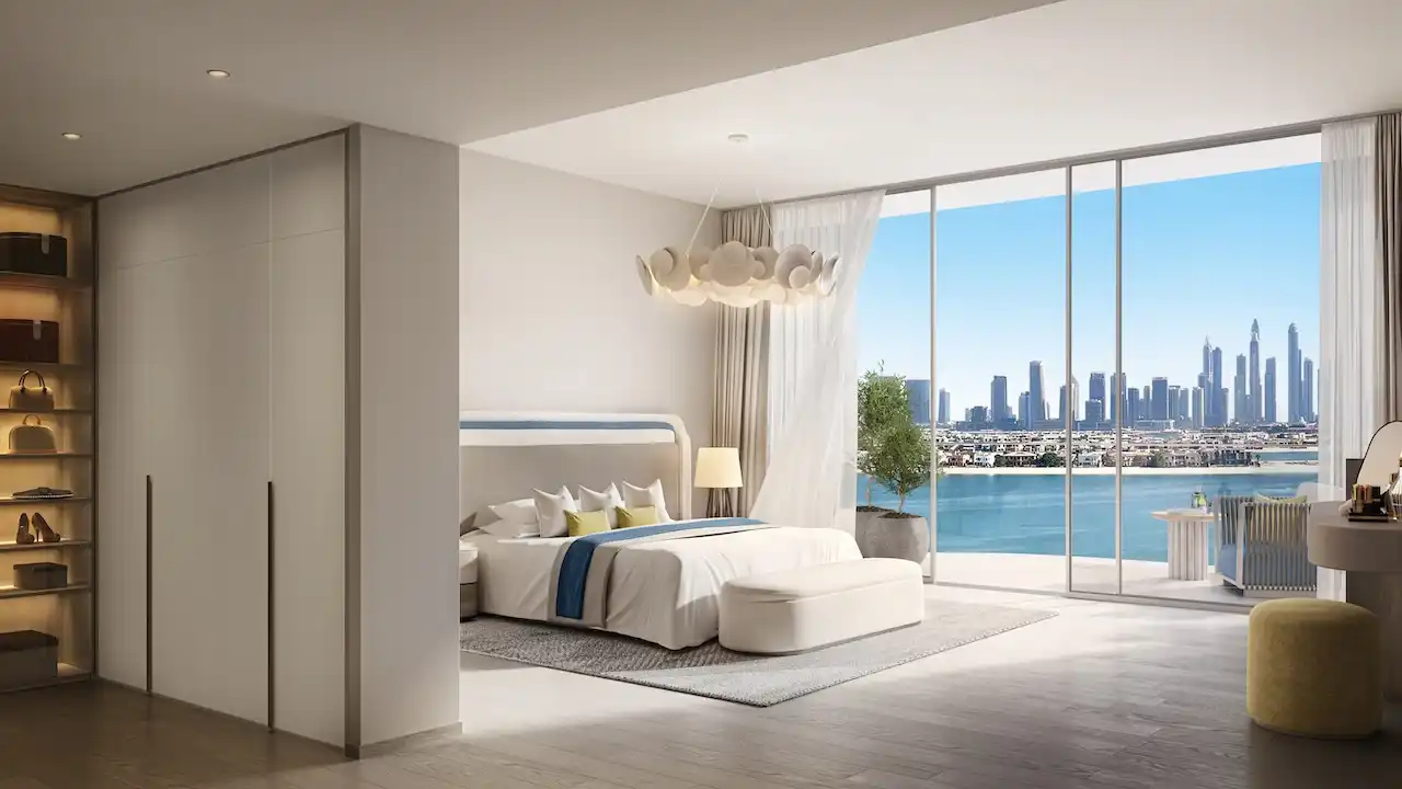 Master bedroom in a 3-bedroom residence at Bella at Passo by Beyond featuring modern interior design, floor-to-ceiling windows, a private balcony, and panoramic waterfront and Dubai skyline views on Palm Jumeirah, Presented by Tohid Fetrat