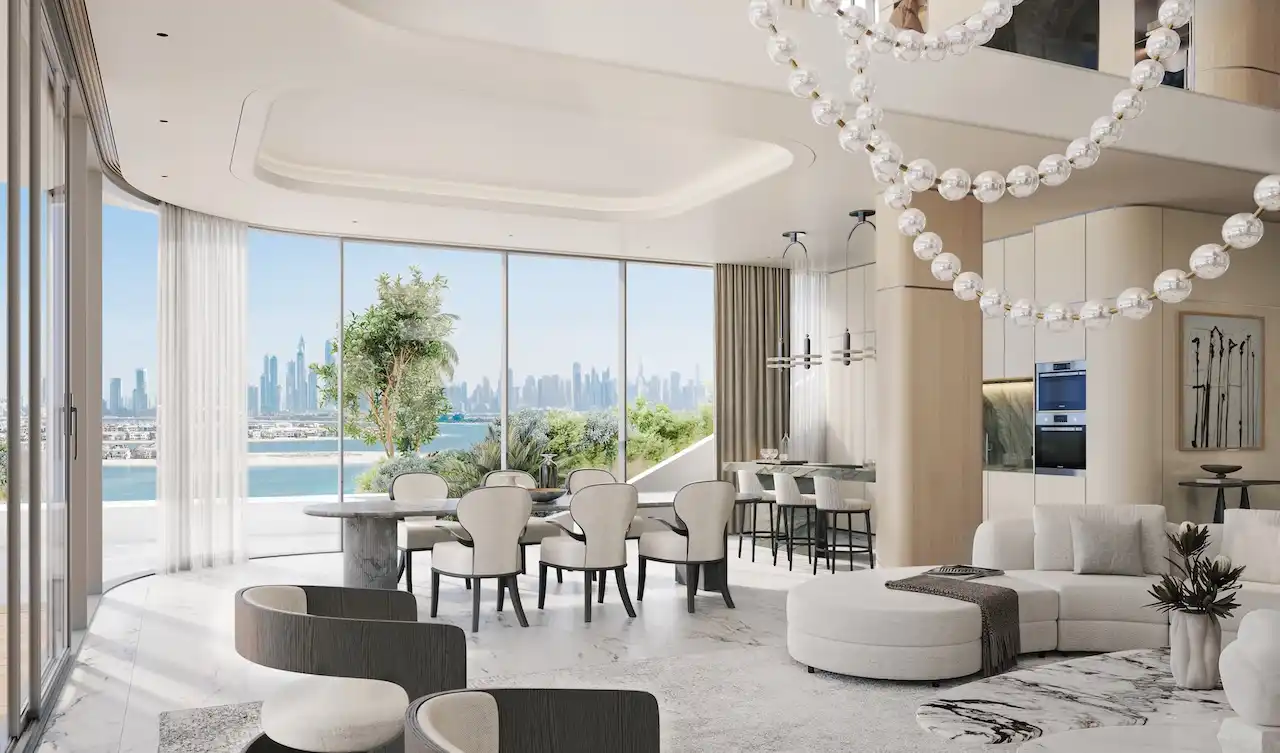 Luxury living and dining area at Bella at Passo by Beyond Beach Mansion featuring an open-plan layout, floor-to-ceiling windows, elegant modern design, and panoramic Dubai skyline views on Palm Jumeirah, Presented by Tohid Fetrat