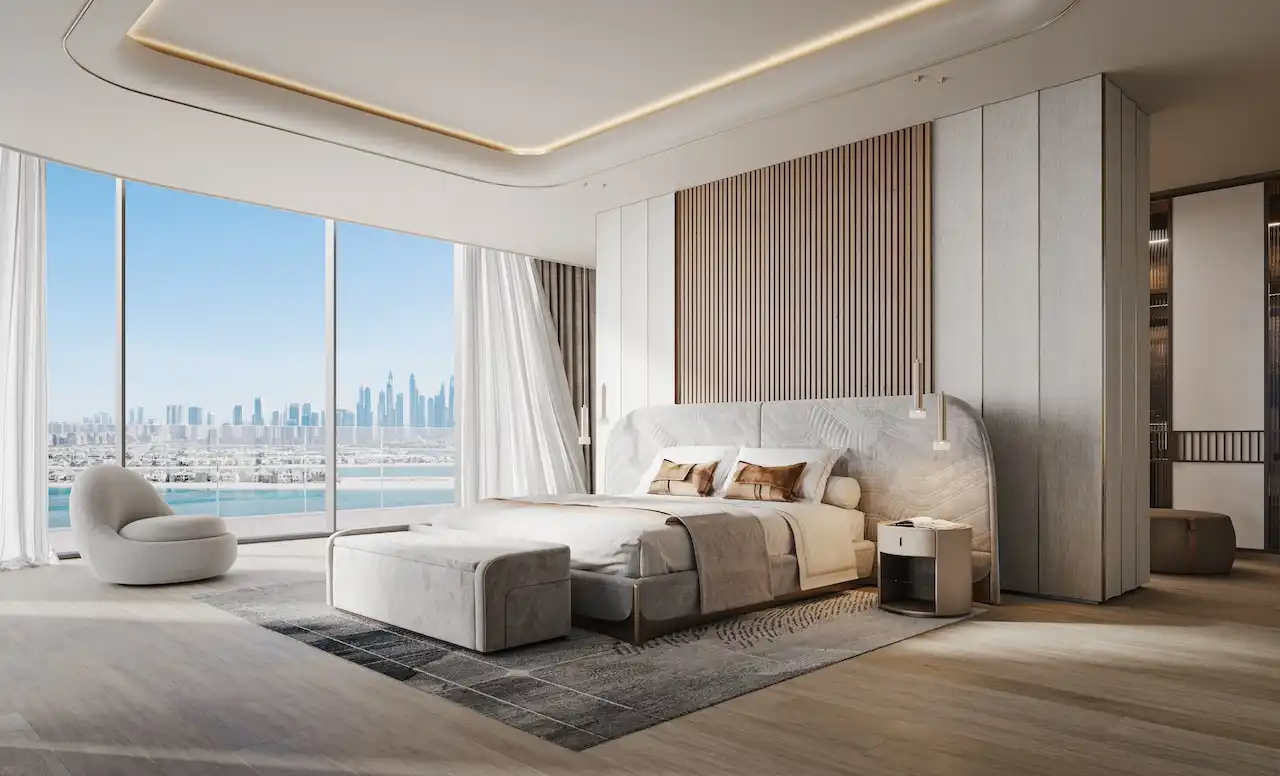 Master bedroom at Bella at Passo by Beyond featuring floor-to-ceiling windows, refined contemporary design, soft neutral palette, integrated wardrobe wall, and panoramic views toward Palm Jumeirah and Dubai skyline, Presented by Tohid Fetrat