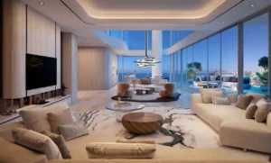 Double-height living and dining area at the Bella at Passo by Beyond penthouse featuring floor-to-ceiling glass, sculptural lighting, refined contemporary interiors, private terrace, and panoramic night views over Palm Jumeirah and Dubai skyline, Presented by Tohid Fetrat