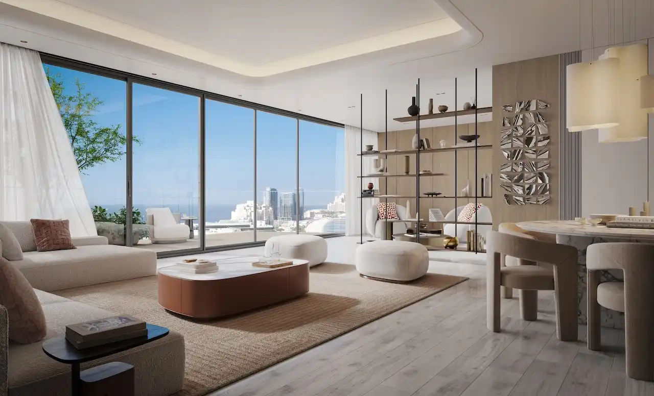 Residence living and dining area at Bella at Passo by Beyond featuring a spacious open-plan layout, floor-to-ceiling windows, refined contemporary furniture, and panoramic views on Palm Jumeirah, Presented by Tohid Fetrat