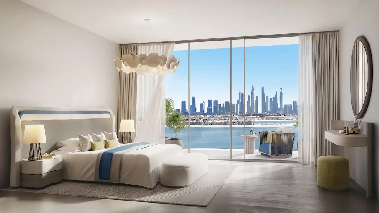 Master bedroom in a 2-bedroom residence at Bella by Beyond featuring modern interior design, floor-to-ceiling windows, a private balcony, and panoramic waterfront and Dubai skyline views on Palm Jumeirah, Presented by Tohid Fetrat