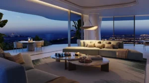 Luxury night-time living area at COMO Residences on Palm Jumeirah featuring designer sofa seating, ambient lighting, bespoke furniture, floor-to-ceiling windows, and panoramic Gulf and Dubai skyline views after sunset. Presented by Tohid Fetrat.