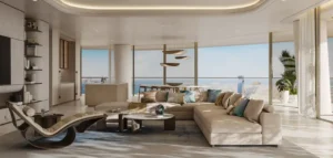 Luxury apartment interior at Como Residences by Nakheel on Palm Jumeirah, featuring an open plan living area with floor to ceiling glass windows, soft neutral furnishings, sculptural lighting, and panoramic sea views reflecting refined waterfront living. Presented by Tohid Fetrat.