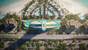 Top view masterplan of COMO Residences on Palm Jumeirah, showcasing the sculptural podium design, elevated amenities, pools, landscaped villas, beachfront setting, and direct access to the Gulf. Presented by Tohid Fetrat.