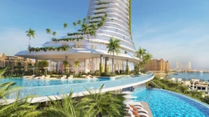 Tiered infinity pool exterior at COMO Residences featuring cascading swimming pools, curved tower architecture, glass balustrades, palm landscaped terraces, and elevated sea views on Palm Jumeirah in Dubai. Presented by Tohid Fetrat.