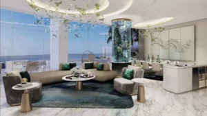 DAMAC Casa luxury living and dining area featuring an iconic aquarium column, sculptural lighting, premium marble flooring, and seamless indoor-outdoor living with sea views in Dubai. Presented by Tohid Fetrat.