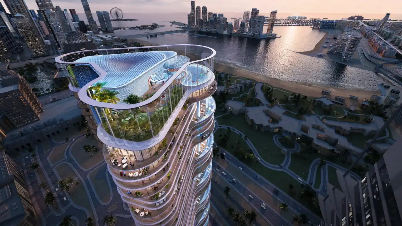 Aerial twilight view of DAMAC Casa showcasing its elevated sky amenities, rooftop infinity pool, layered curved terraces, and panoramic waterfront views across Dubai’s skyline. Presented by Tohid Fetrat.