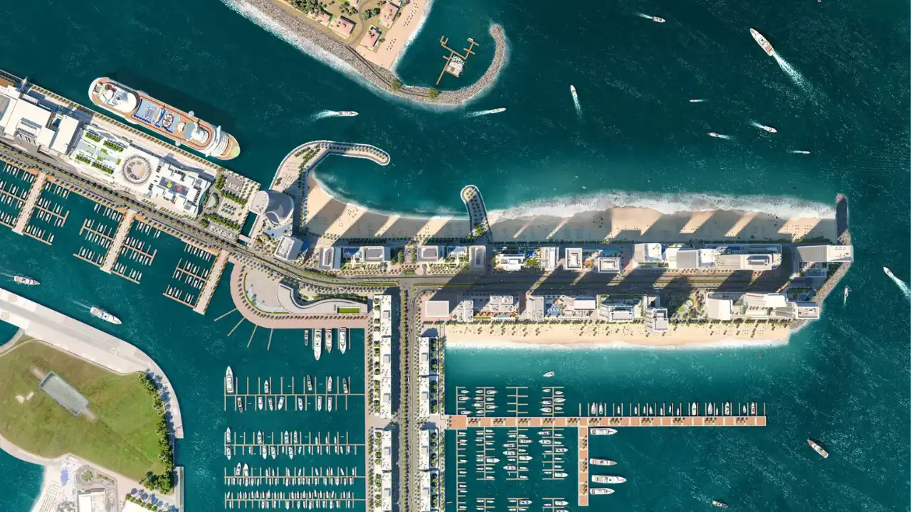 Aerial master plan view of Emaar Beachfront in Dubai Harbour, showing beachfront residential towers, private beaches, marina berths, yacht access, and direct waterfront connectivity between Dubai Marina and Palm Jumeirah, presented by Tohid Fetrat