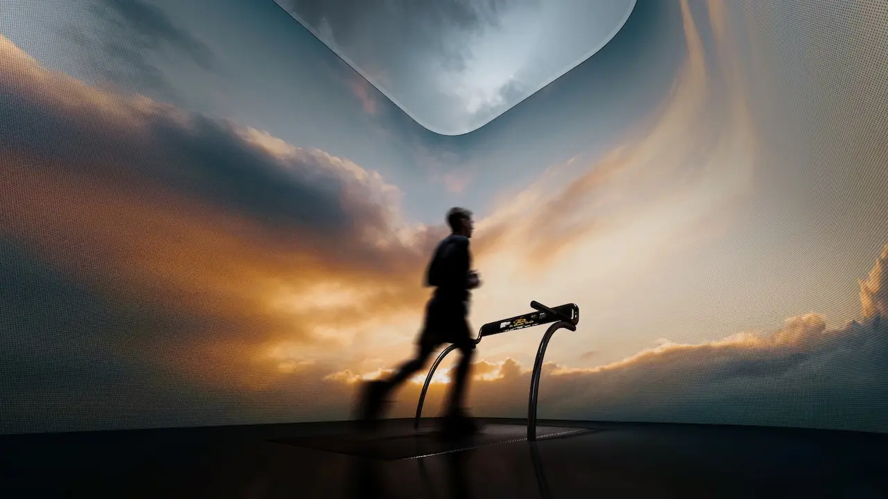 Luxury gym and fitness studio at Haus of Tenet by IRTH in Business Bay, Dubai, featuring a modern treadmill setup, immersive digital sky backdrop, and a refined wellness environment designed for active urban lifestyles, presented by Tohid Fetrat