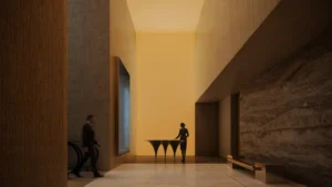 Main lobby interior of Haus of Tenet by IRTH featuring minimalist architectural design, warm ambient lighting, and refined materials in Business Bay Dubai, presented by Tohid Fetrat