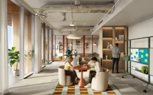 Collaborative lounge workspace at HQ by Rove featuring casual seating, shared tables, indoor plants, and warm contemporary interiors in Dubai, Presented by Tohid Fetrat