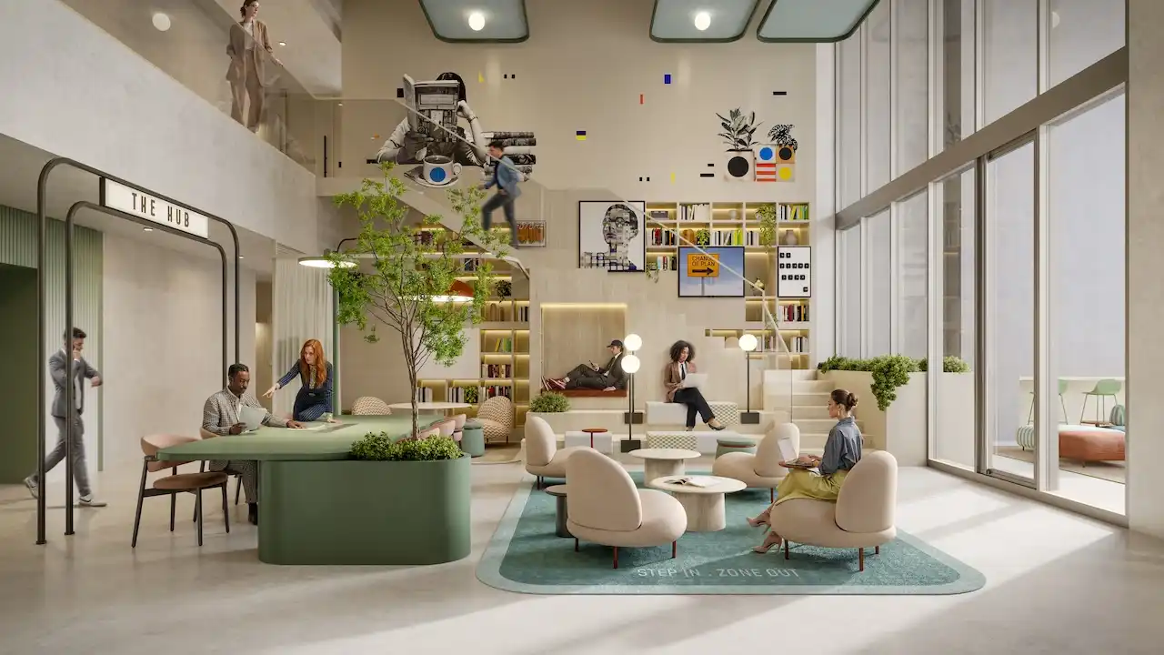 Communal hub interior at HQ by Rove featuring a double height social space with lounge seating, shared tables, indoor greenery, and curated wall art in Dubai, Presented by Tohid Fetrat