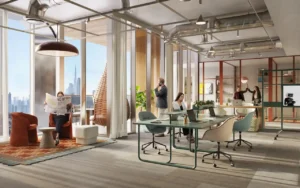 Flexible workspace at HQ by Rove featuring shared workstations, lounge seating, indoor plants, and large windows with Dubai skyline views, Presented by Tohid Fetrat