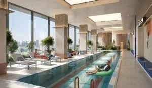 HQ by Rove indoor spa pool with relaxed lounge seating, natural light, and wellness-focused social atmosphere in Dubai, Presented by Tohid Fetrat