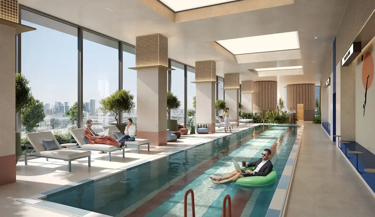 HQ by Rove indoor spa pool with relaxed lounge seating, natural light, and wellness-focused social atmosphere in Dubai, Presented by Tohid Fetrat