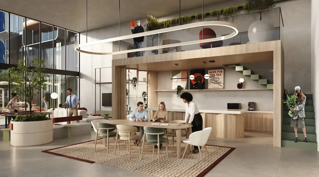 Rentable collaborative space at HQ by Rove featuring a double height interior, shared work tables, lounge seating, and integrated greenery in Dubai, Presented by Tohid Fetrat