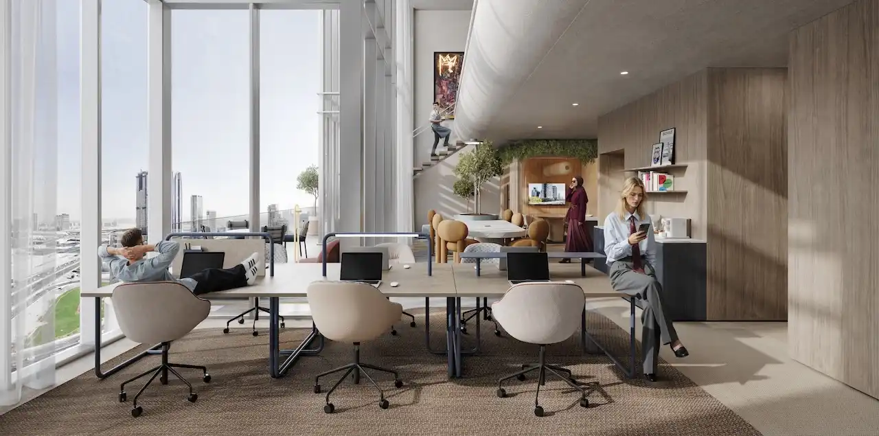 HQ by Rove typical loft workspace with shared desks, relaxed seating, and floor-to-ceiling windows overlooking Dubai, Presented by Tohid Fetrat