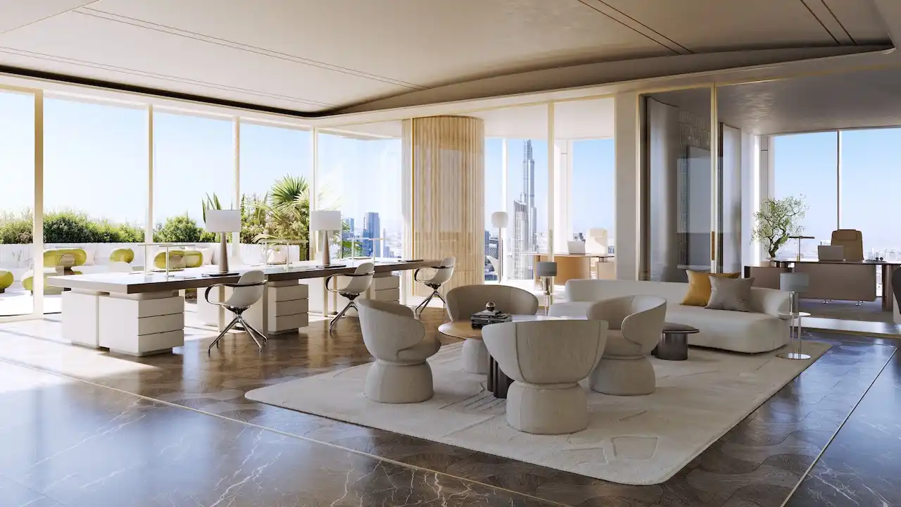 Luxury interior living and dining space at Lumena Alta with floor-to-ceiling windows and direct views of Burj Khalifa and the Dubai skyline. Presented by Tohid Fetrat.
