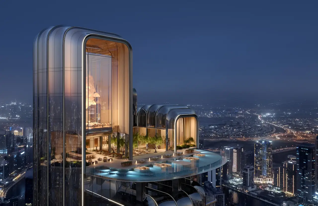 Lumena Alta rooftop infinity pool and sky terrace at night, featuring elevated leisure spaces, architectural lighting, and panoramic Dubai skyline views. Presented by Tohid Fetrat.
