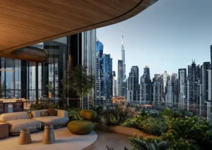 Luxury sky lounge at Lumena Alta overlooking the Dubai skyline with Burj Khalifa views featuring refined seating lush greenery and a contemporary architectural design. Presented by Tohid Fetrat.