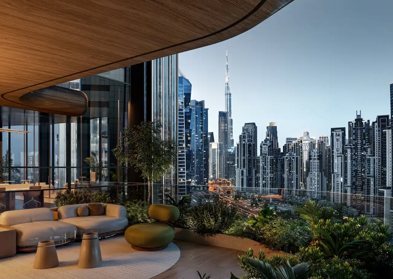 Luxury sky lounge at Lumena Alta overlooking the Dubai skyline with Burj Khalifa views featuring refined seating lush greenery and a contemporary architectural design. Presented by Tohid Fetrat.