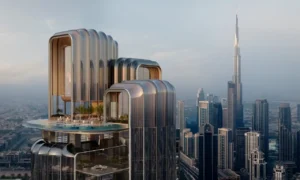 Sky terrace and infinity pool at Lumena Alta with sculptural glass volumes and panoramic Burj Khalifa views across Dubai’s skyline. Presented by Tohid Fetrat.