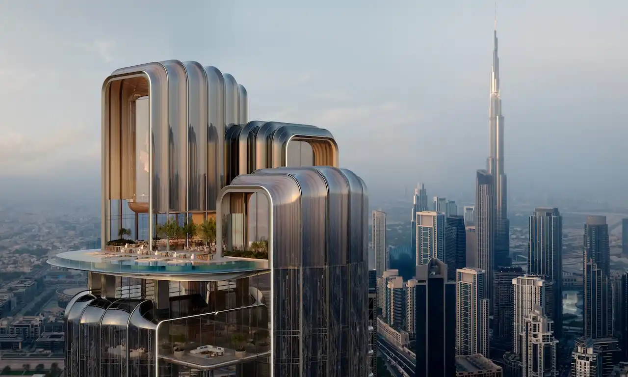 Sky terrace and infinity pool at Lumena Alta with sculptural glass volumes and panoramic Burj Khalifa views across Dubai’s skyline. Presented by Tohid Fetrat.