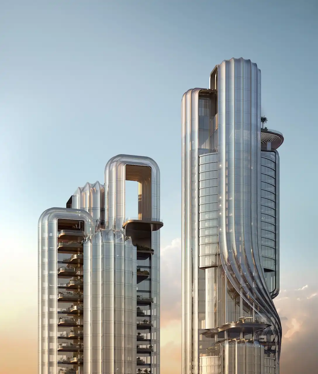 Iconic twin towers of Lumena Alta featuring sculptural curved architecture and layered glass façades, captured at sunset in Dubai. Presented by Tohid Fetrat.