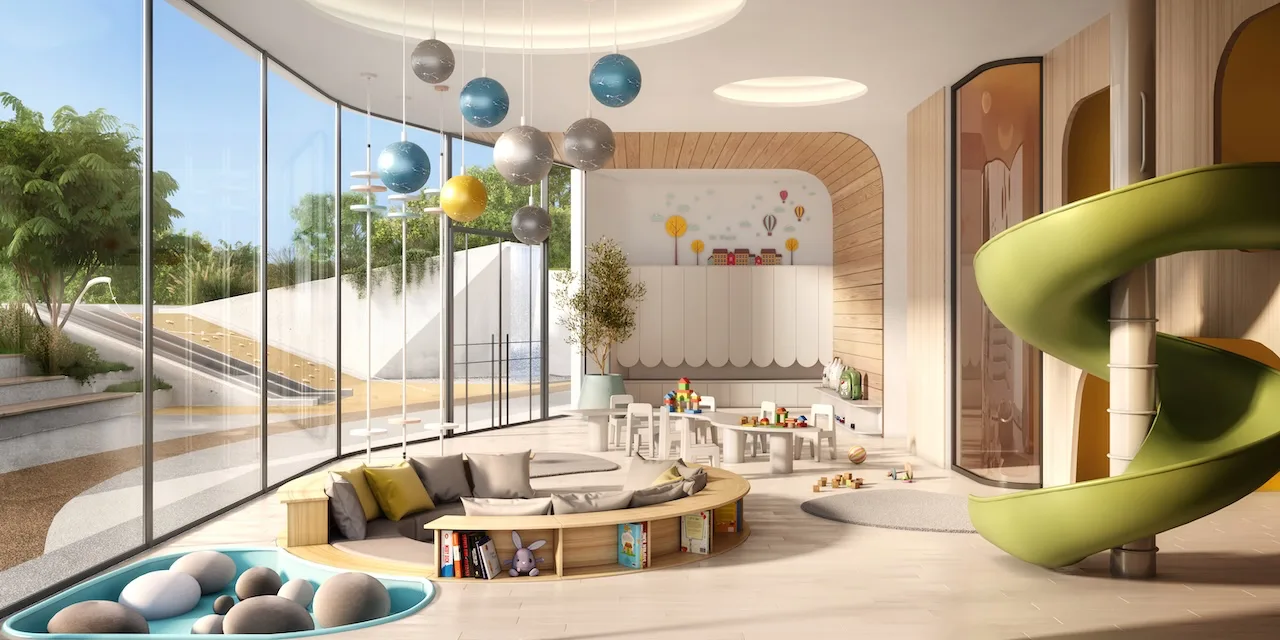 Indoor Kids Pavilion at Passo by Beyond Palm Jumeirah featuring a safe creative play area with soft seating reading corners interactive toys floor to ceiling glass and a spiral slide designed for children wellness and learning. Presented by Tohid Fetrat.