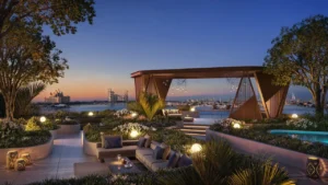 Sunset view of the outdoor social lounge at Passo by Beyond on Palm Jumeirah, featuring landscaped terraces, ambient lighting, elegant seating areas, and panoramic views over the Gulf, designed for refined social gatherings. Presented by Tohid Fetrat.