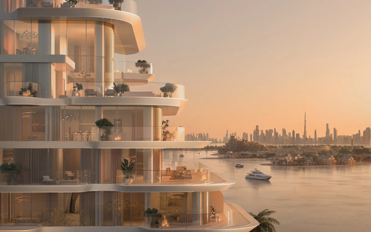 Upper facade view of Passo by Beyond on Palm Jumeirah at sunset, showcasing curved glass balconies, luxury waterfront residences, yachts on the water, and the Dubai skyline in the background. Presented by Tohid Fetrat.