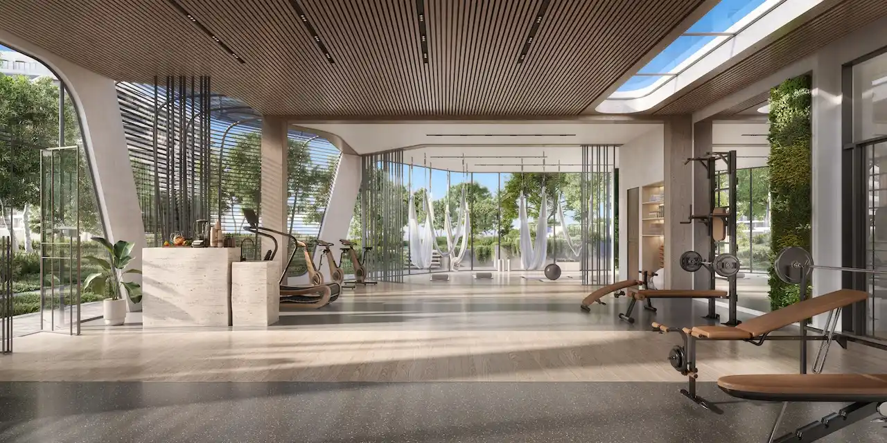 Indoor wellness pavilion at Passo by Beyond Palm Jumeirah featuring a luxury gym yoga and fitness areas natural light modern equipment and a serene resort style atmosphere. Presented by Tohid Fetrat.