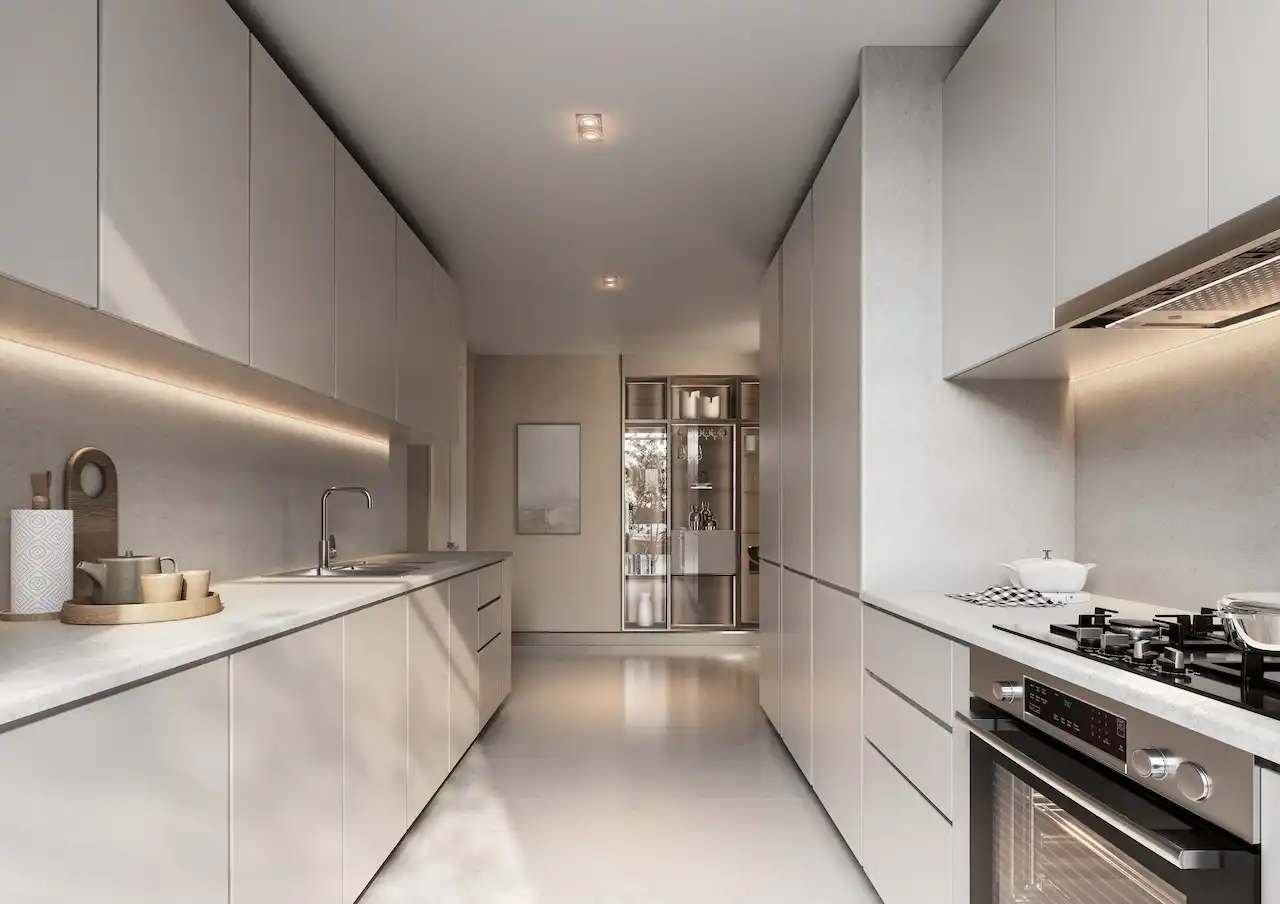 Modern kitchen interior of a 4 bedroom Type A villa at Sobha Elwood featuring sleek built-in cabinetry, integrated appliances, stone countertops, and minimalist contemporary design for luxury villa living in Dubai, Presented by Tohid Fetrat