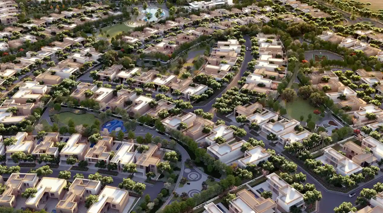 Aerial master plan view of Sobha Elwood community in Dubailand, showcasing low-density luxury villas, landscaped streets, green parks, and a family-oriented residential layout, Presented by Tohid Fetrat