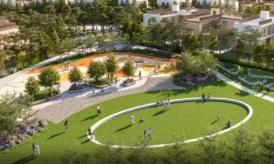 Aerial view of Taiga Park in Sobha Elwood, showcasing landscaped green lawns, family activity zones, walking paths, and community seating areas within a master-planned residential community in Dubai, Presented by Tohid Fetrat