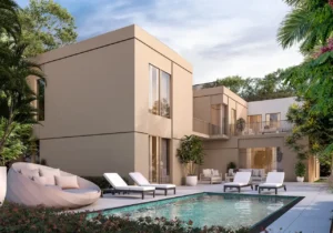 Private courtyard of the Type 5B villa at Sobha Elwood featuring a contemporary two-storey layout, outdoor seating, and a private swimming pool surrounded by landscaped greenery in a premium master-planned community in Dubai, Presented by Tohid Fetrat