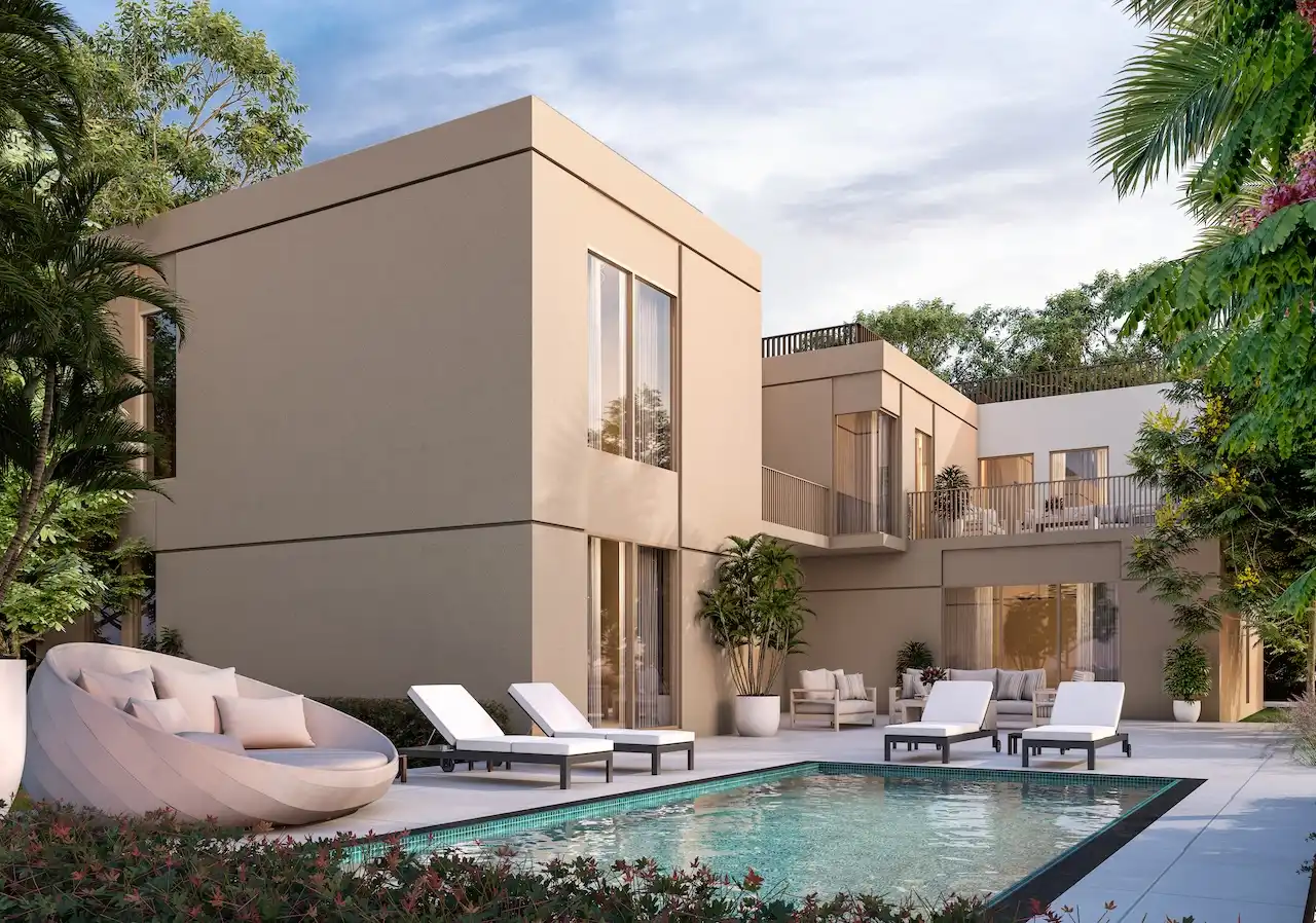Private courtyard of the Type 5B villa at Sobha Elwood featuring a contemporary two-storey layout, outdoor seating, and a private swimming pool surrounded by landscaped greenery in a premium master-planned community in Dubai, Presented by Tohid Fetrat