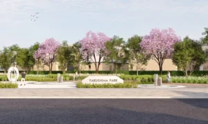 Front entrance view of Yakushima Park at Sobha Elwood featuring cherry blossom trees, landscaped gardens, and pedestrian pathways within a master-planned residential community in Dubai, Presented by Tohid Fetrat