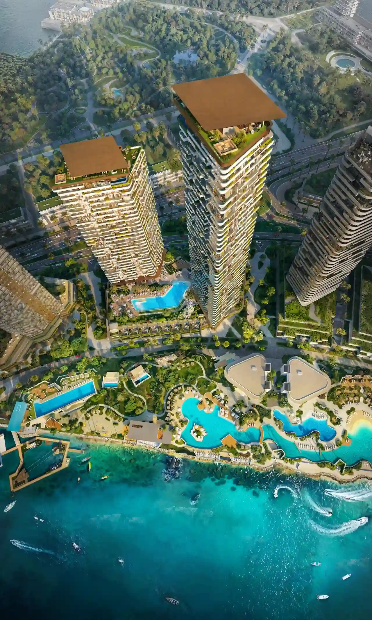 Aerial masterplan view of Soulever featuring twin waterfront towers, resort style pools, landscaped podiums, and direct Gulf frontage, showcasing ultra luxury coastal living in Dubai. Presented by Tohid Fetrat.