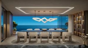 Luxury penthouse dining room at Soulever featuring panoramic Gulf views, floor to ceiling glass, bespoke lighting, and refined contemporary interiors in Dubai. Presented by Tohid Fetrat.