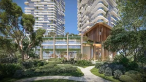 Landscaped promenade at Soulever residences featuring lush greenery, pedestrian pathways, and contemporary residential towers overlooking the Gulf in Dubai. Presented by Tohid Fetrat.