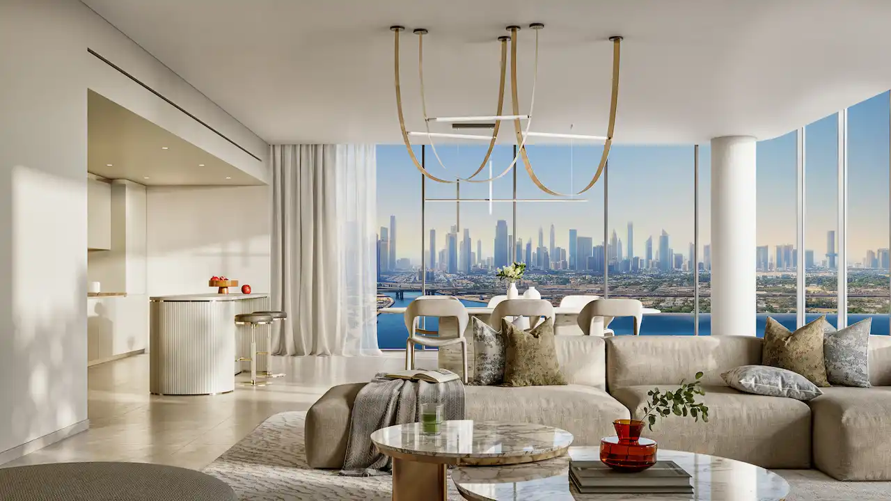Luxury three-bedroom living and dining interior at The Edit at d3 with open-plan layout, designer furnishings, floor-to-ceiling windows, and panoramic Dubai skyline and waterfront views in Dubai Design District, Presented by Tohid Fetrat