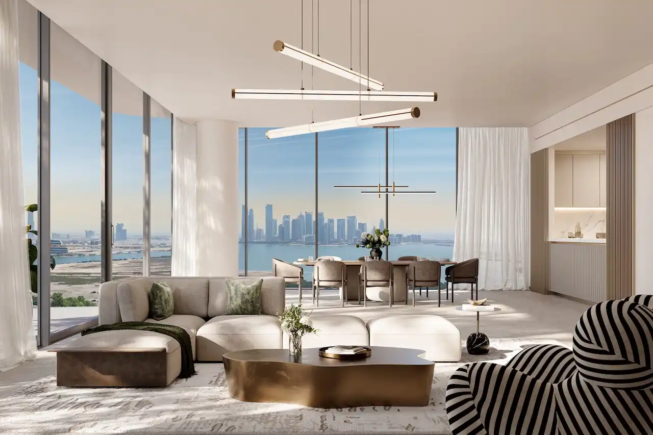 Luxury four-bedroom living and dining interior at The Edit at d3 featuring an open-plan layout, bespoke lighting, floor-to-ceiling windows, and panoramic Dubai skyline and waterfront views in Dubai Design District, Presented by Tohid Fetrat