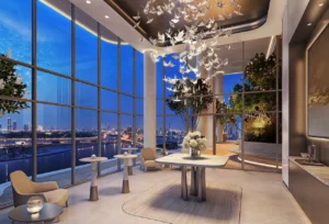 Luxury events lounge with floor-to-ceiling windows, artistic ceiling installation, and city skyline views at The Edit at d3 in Dubai Design District, Presented by Tohid Fetrat